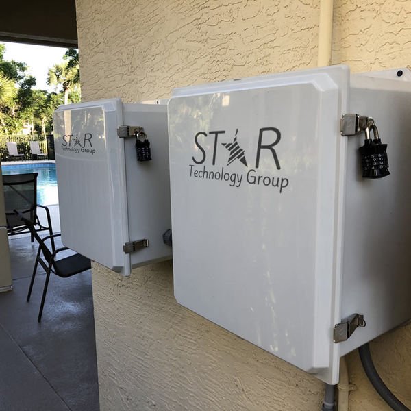 Two mounted outdoor equipment enclosures.
