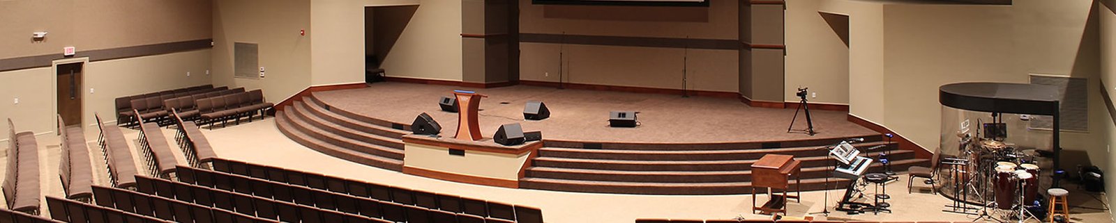 Worship space with seating and a presentation platform
